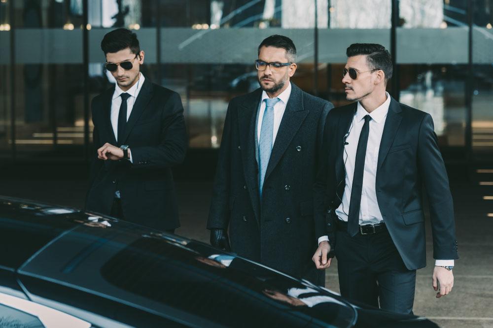Two Prosegur Global Risk agents in Orlando providing escort and guarding services