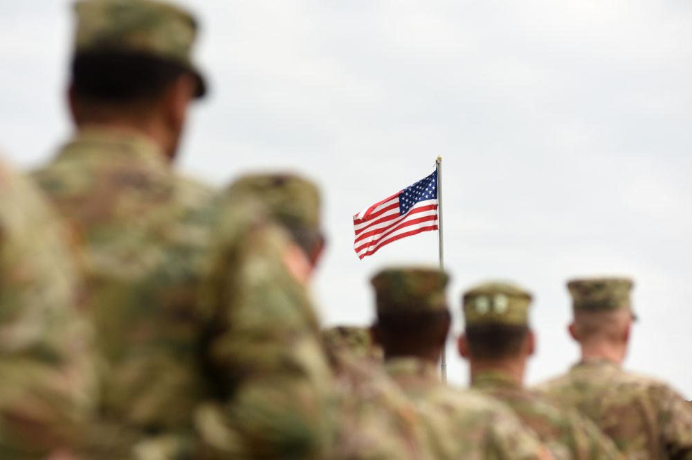 Military personnel standing at attention