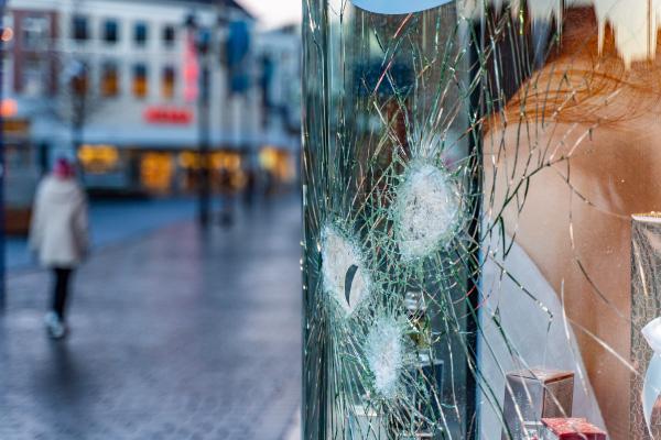 Commercial property vandalism with smashed windows