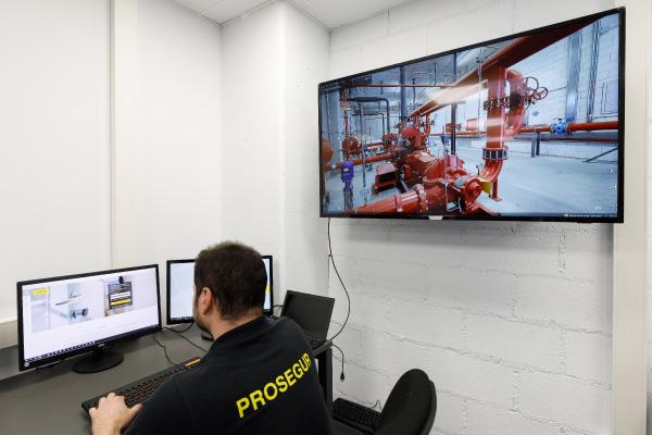 A Prosegur security agent monitoring compliance issues via camera