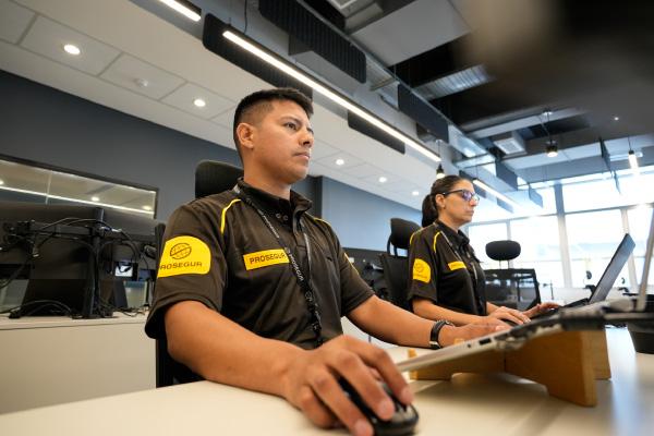 Data center security officer A Prosegur security agent providing remote security monitoring services to a high tech client