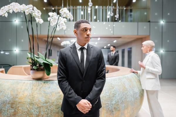 Hotel Lobby Security A Prosegur security officer providing hotel security in a hotel lobby