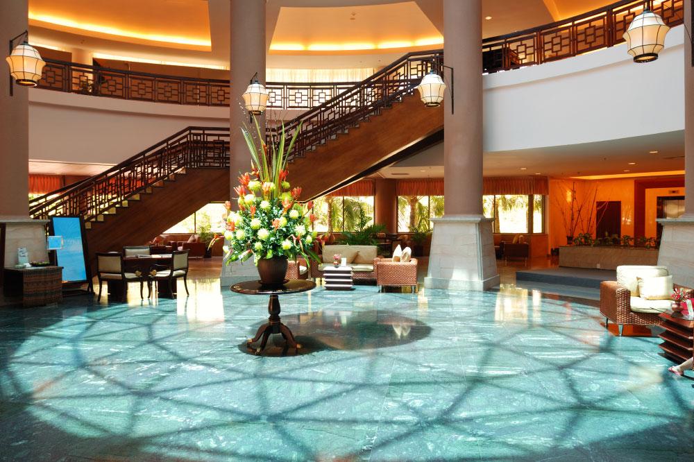 A hotel lobby with security