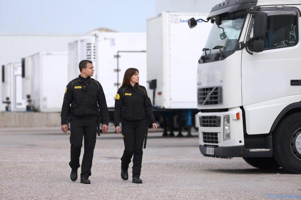 Two Prosegur security officers on patrol for a logistics warehouse client