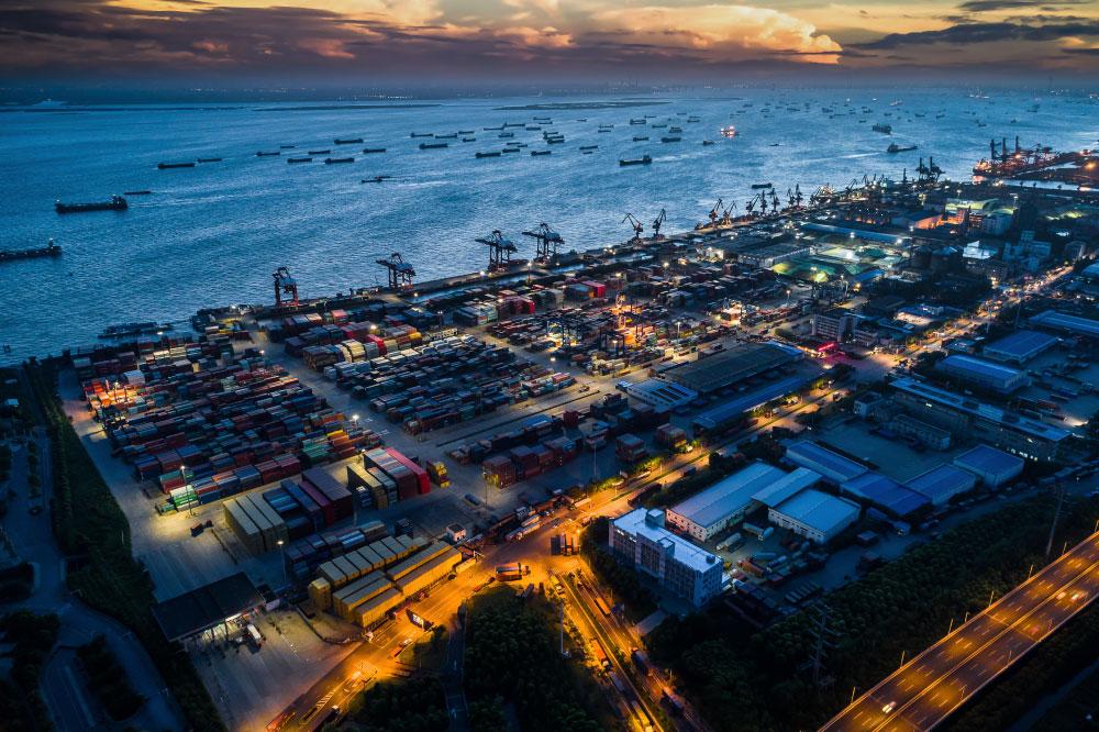 An Aeriel view of a port and surrounding warehouse facilities