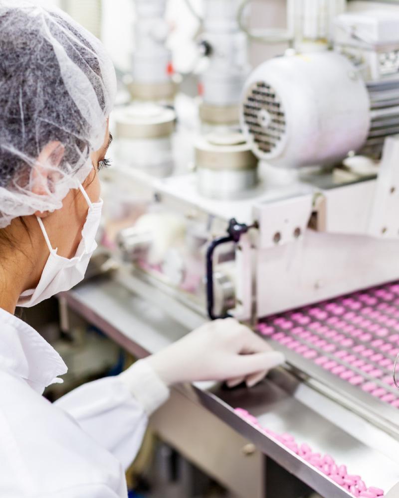 Pharmaceutical Manufacuring A worker doing pharmaceutical manufacturing and research