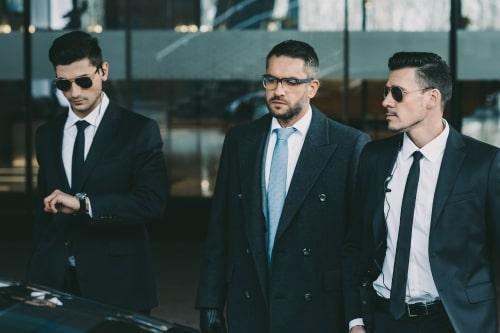 Two Prosegur Global Risk agents in Atlanta providing escort and guarding services