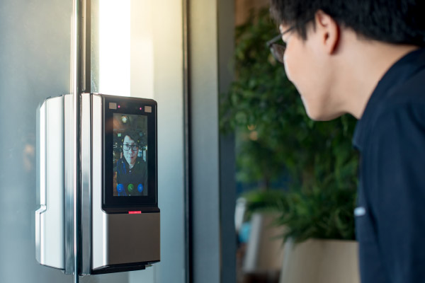 A Prosegur Security client interacting with a biometric access control system